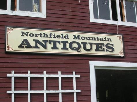 Northfield Mountain Antiques — wall-mounted building sign by Hale Custom Signs