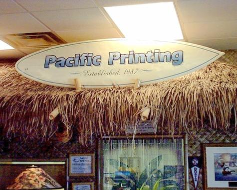 Pacific Printing Surfboard with airbrush graphic — specialty custom sign by Hale Custom Signs