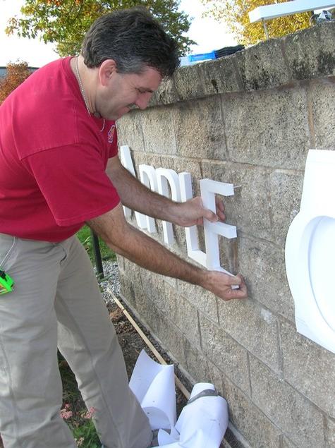 Installing Dimensional Letters — sign being fabricated on the bench by Hale Custom Signs