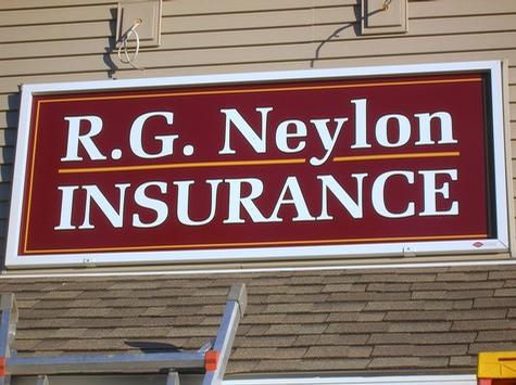 R. G. Neylon Insurance — wall-mounted building sign by Hale Custom Signs