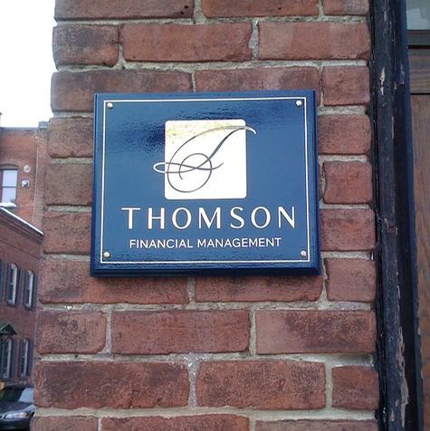 Thomson Financial Management — wall-mounted building sign by Hale Custom Signs