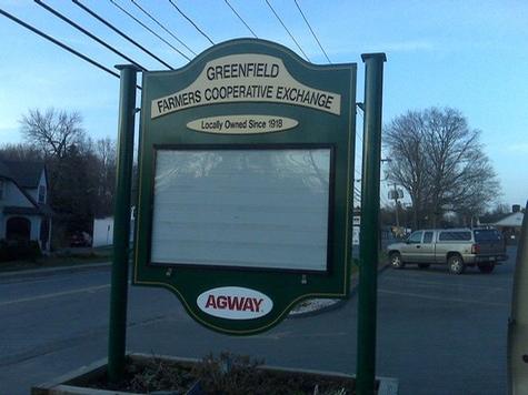 Greenfield Farmers Cooperative Exchange — sign being fabricated on the bench by Hale Custom Signs