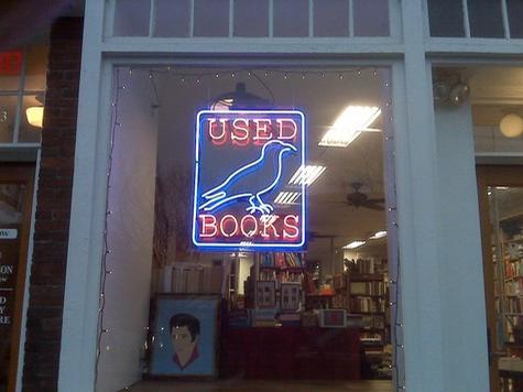 Raven Books — custom neon sign by Hale Custom Signs