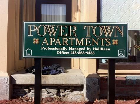 Power Town Apartments — sign being fabricated on the bench by Hale Custom Signs