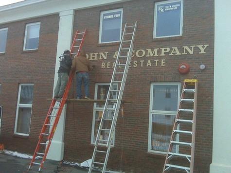 Cohn & Company - Install — sign being fabricated on the bench by Hale Custom Signs
