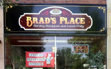 Brad’s Place - MDO — wall-mounted building sign by Hale Custom Signs