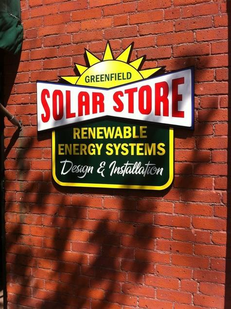 Greenfield Solar Store — wall-mounted building sign by Hale Custom Signs