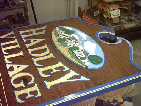 Hadley Village Condominiums — sandblasted dimensional sign by Hale Custom Signs
