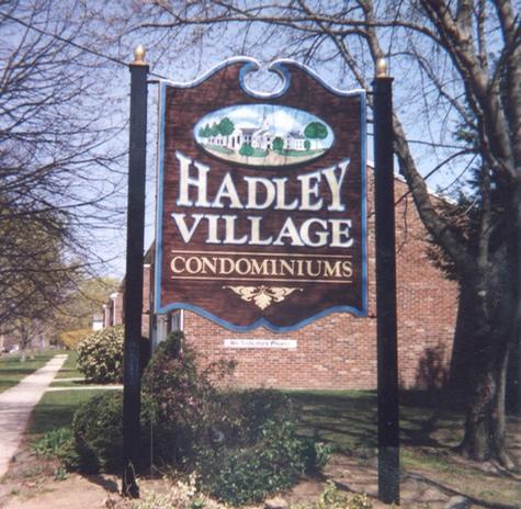 Hadley Village Condominiums — sandblasted dimensional sign by Hale Custom Signs