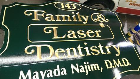 Family Laser Dentistry — hand-carved dimensional sign by Hale Custom Signs