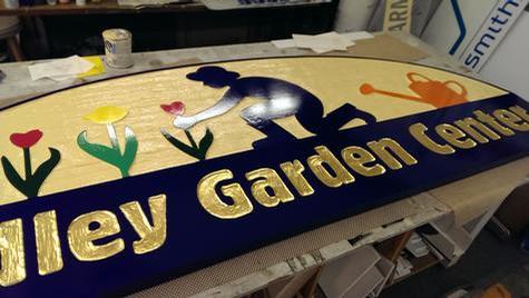 Hadley Garden Center - After repaint — hand-carved dimensional sign by Hale Custom Signs