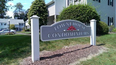 Town House Condominiums — hand-carved dimensional sign by Hale Custom Signs