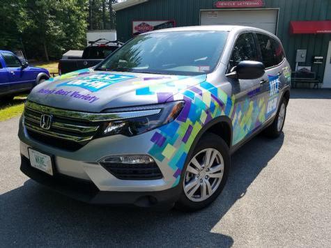 WKNE Radio station wrap graphics — vehicle graphics installation by Hale Custom Signs