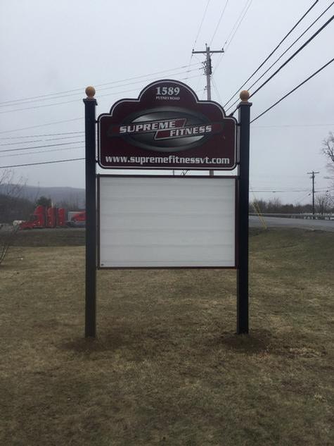 supreme fitness- Wood panel shaped with lower changeable copy area — post and panel sign by Hale Custom Signs