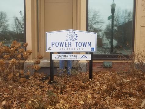 Carved letter sign- POWERTOWN Apartments — hand-carved dimensional sign by Hale Custom Signs