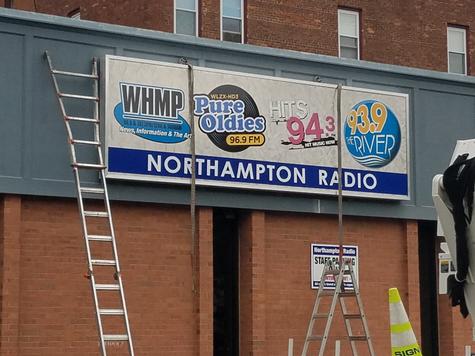 Northampton Radio Group 5ft x 16ft aluminum cabinet — wall-mounted building sign by Hale Custom Signs