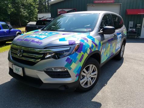 WKNE Station vehicle wrap — corporate identity sign by Hale Custom Signs