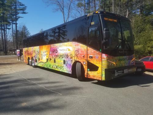 Big Brother Big Sister Travel Kuz bus wrap — vehicle graphics installation by Hale Custom Signs