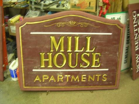 Mill House - (before) — sign being fabricated on the bench by Hale Custom Signs
