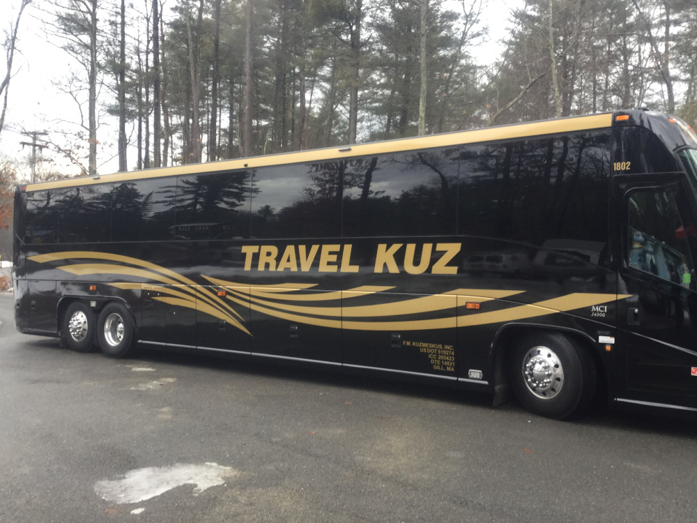 A completed vehicle graphics project — full-colour bus lettering by Hale Custom Signs